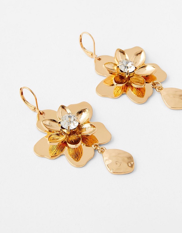 Gold flower shaped earrings from Accessorize.
