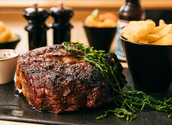 A large steak and fries