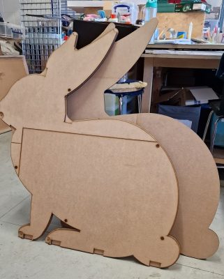 The rabbit sculpture shaped in wood